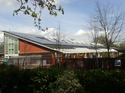 Solar panels on the rooftop of Botley School, owned and managed by Low Carbon Hub