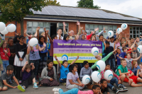 Solar panels on the rooftop of Larkrise School, owned and managed by Low Carbon Hub