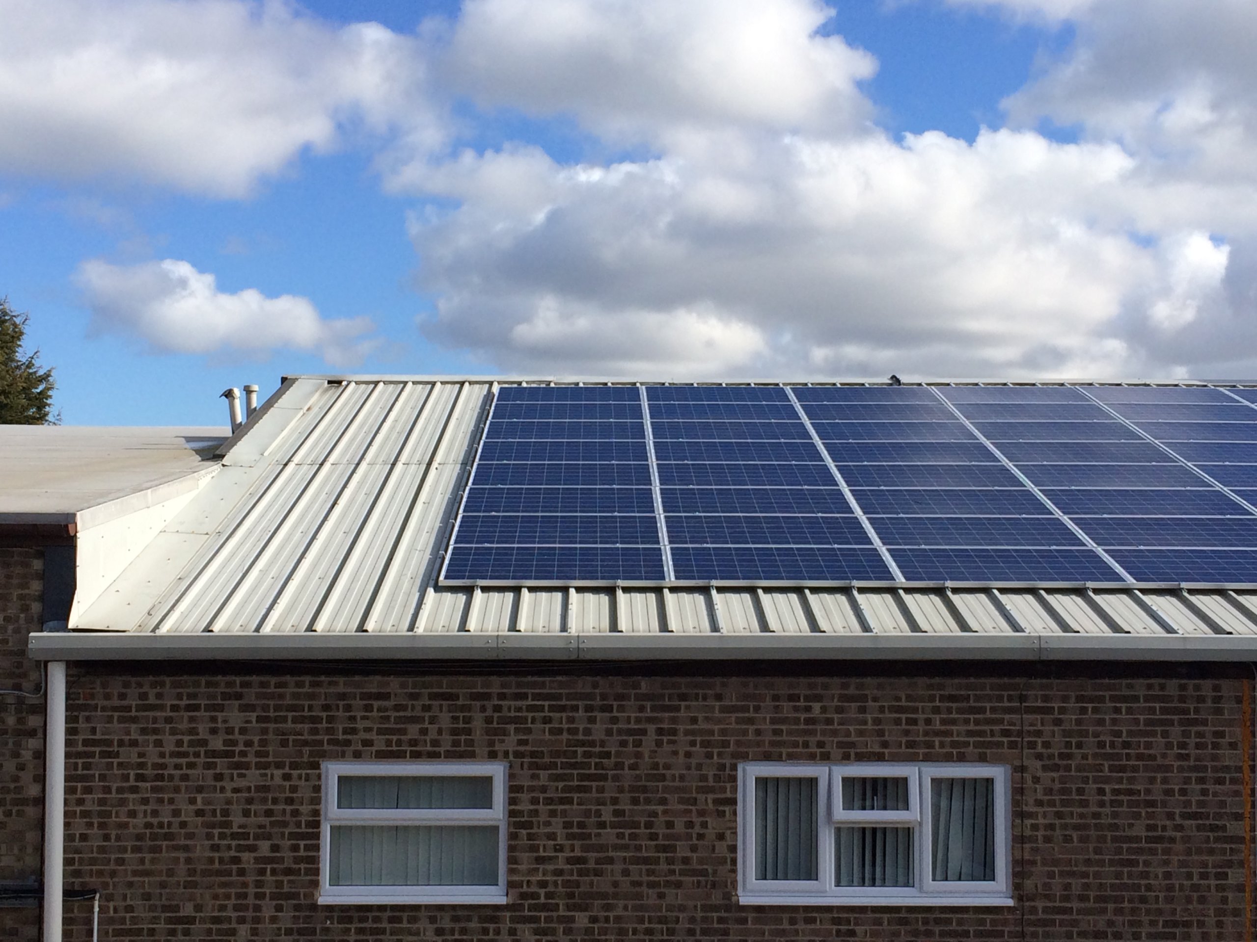 Solar panels on the rooftop of Owen Mumford, owned and managed by Low Carbon Hub