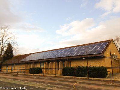 Solar panels on the rooftop of Cherwell School, owned and managed by Low Carbon Hub