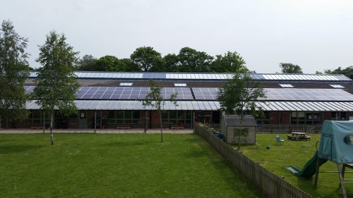 Solar panels on the rooftop of Chilton School, owned and managed by Low Carbon Hub