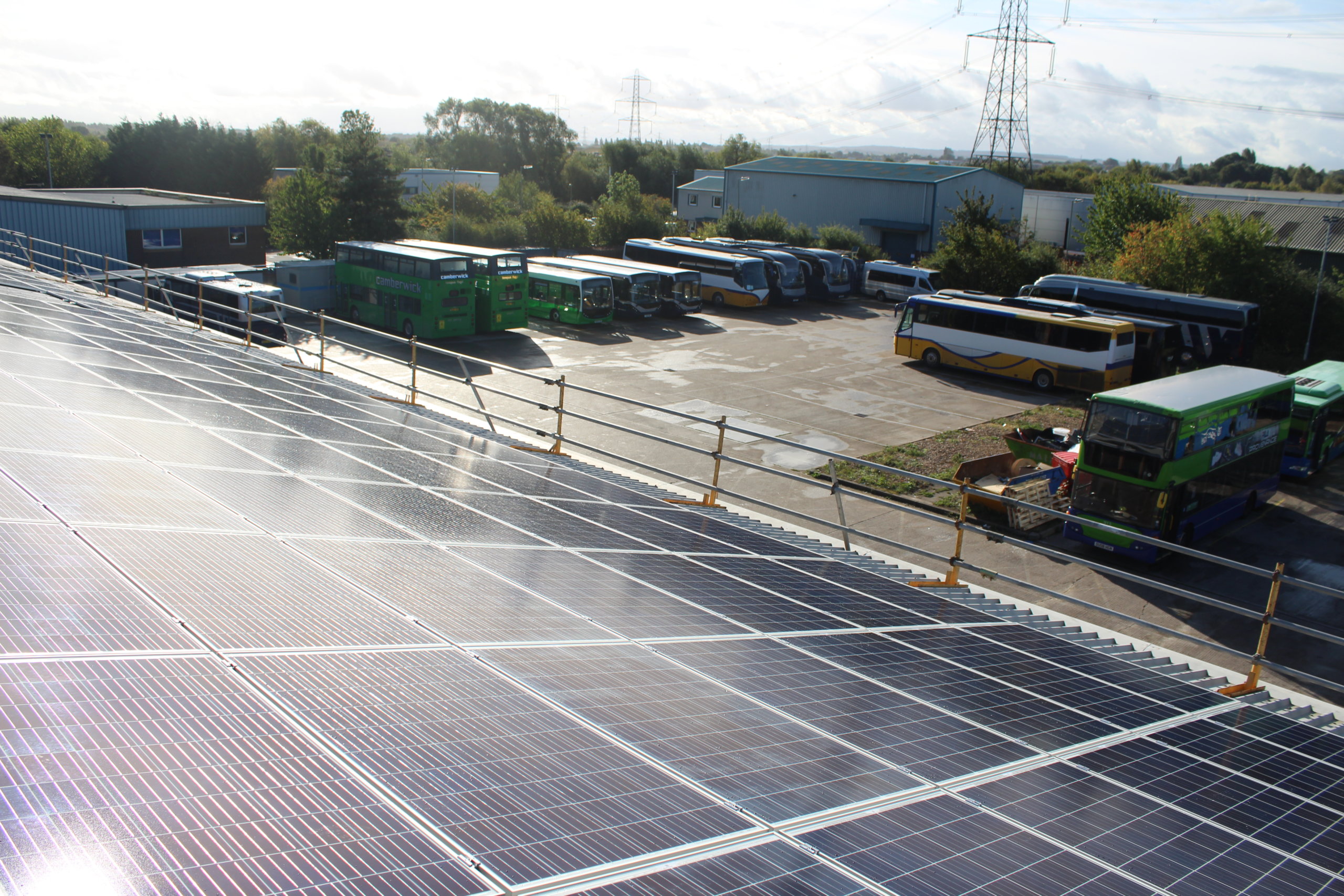 Solar panels on the rooftop of Thames Travel, owned and managed by Low Carbon Hub