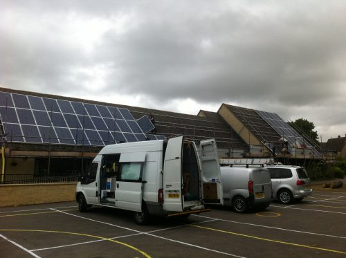 Solar panels on the rooftop of Stonesfield Primary School, owned and managed by Low Carbon Hub