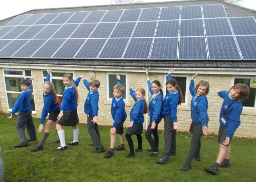 Solar panels on the rooftop of Middle Barton School, owned and managed by Low Carbon Hub