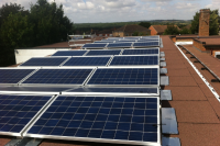 Solar panels on the rooftop of Rose Hill School, owned and managed by Low Carbon Hub