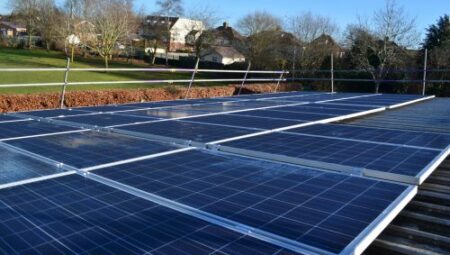 Solar panels on the rooftop of West Kidlington School, owned and managed by Low Carbon Hub