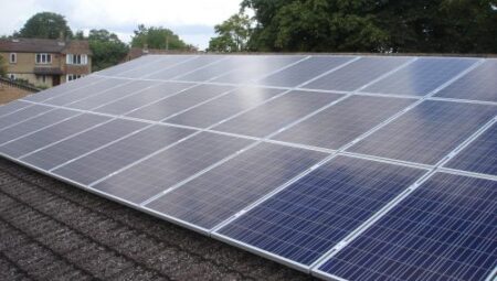 Solar panels on the rooftop of Wheatley Park School, owned and managed by Low Carbon Hub