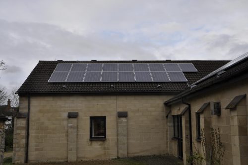 Solar panels on the rooftop of Watchfield Village Hal