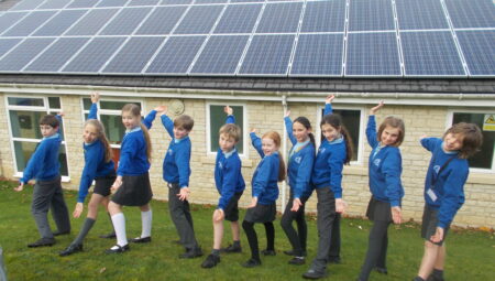 Solar panels on the rooftop of Middle Barton School, owned and managed by Low Carbon Hub