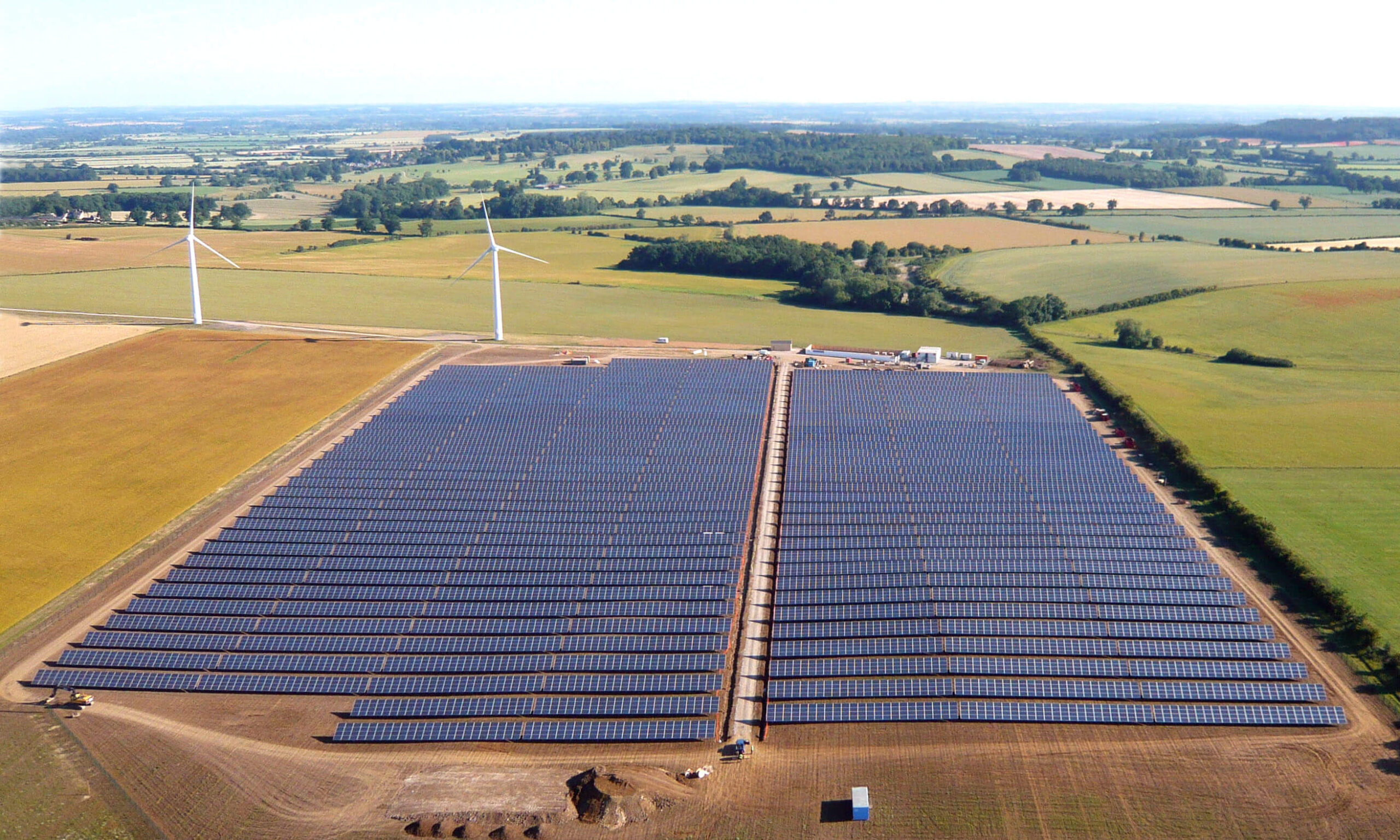 Westmill Solar Park with part of Westmill Wind Farm in the background