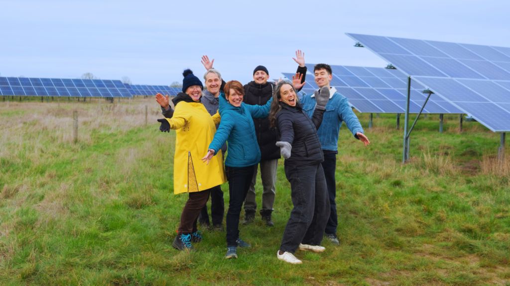 The Low Carbon Hub team celebrate the new solar battery at Ray Valley Solar.